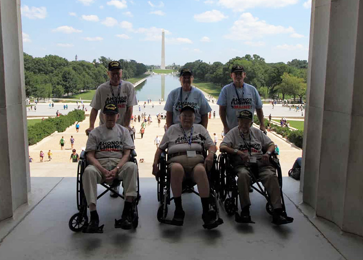 Honor flight vets at Washington Memorial